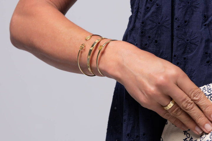 Gracewear Collection shield bangle bracelet, stylish accessories with a sleek metallic design for elegant wrist wear.