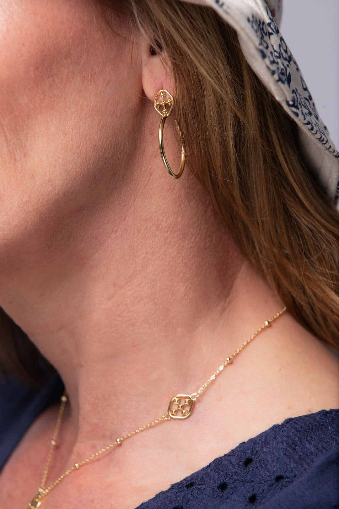 Gracewear Collection shield choker necklace featuring a sleek metallic design, close-up view of the stylish accessory.