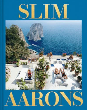 Cover image of Slim Aarons: Essential Book, a home decor book by Hachette/Chronicle featuring vibrant photography and stylish design.
