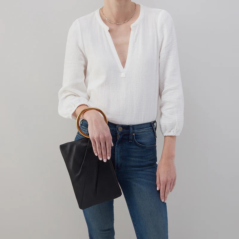 Black Sheila Ring Clutch by Hobo Bags, elegant accessories with a sleek design, featuring a ring detail and compact size.