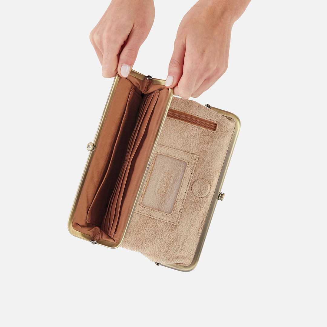 Hobo Bags Lauren Wallet in gold, stylish accessories with a sleek design, featuring a smooth leather finish and compact size.
