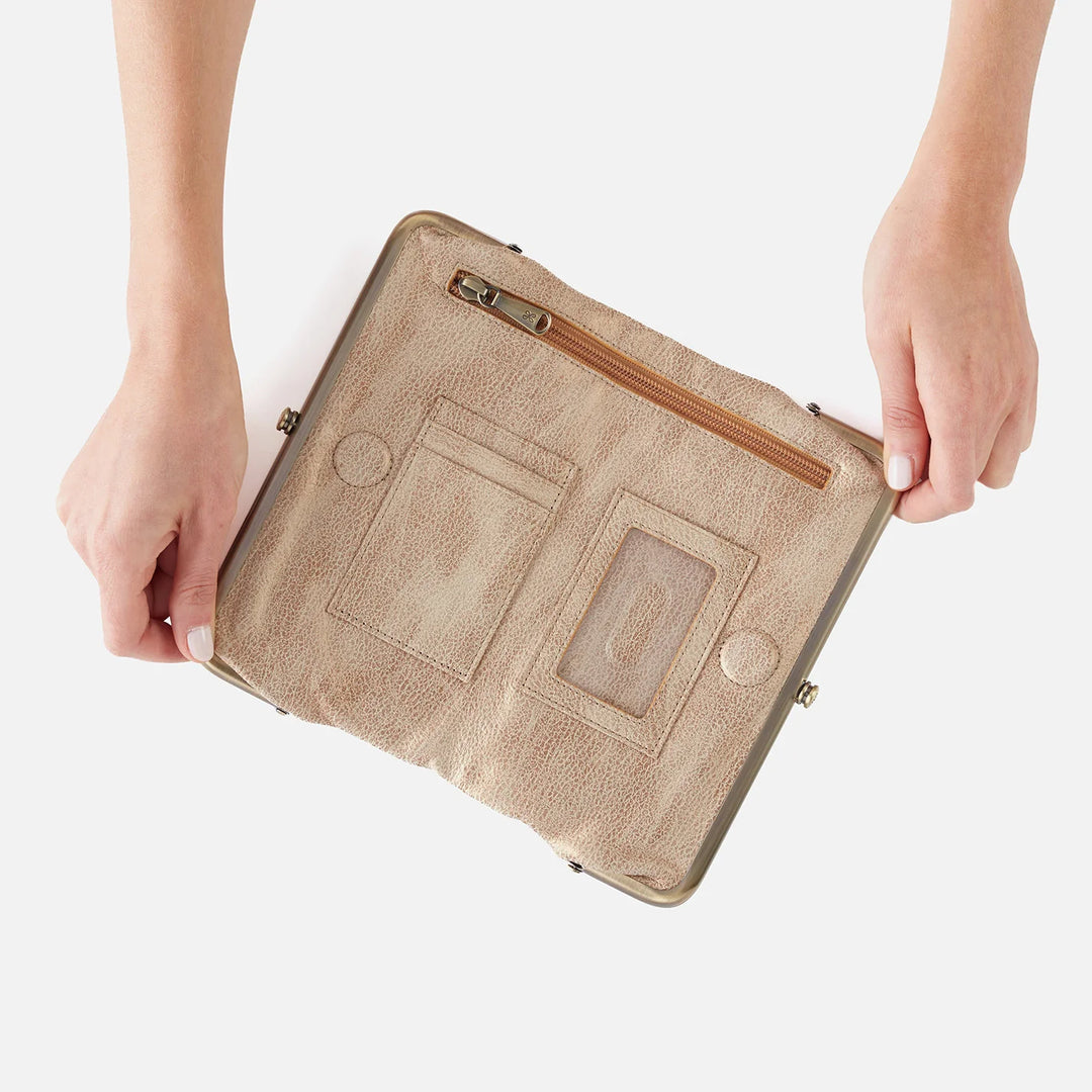 Hobo Bags Lauren Wallet in gold, a stylish accessory with a sleek design and compact size, perfect for everyday use.