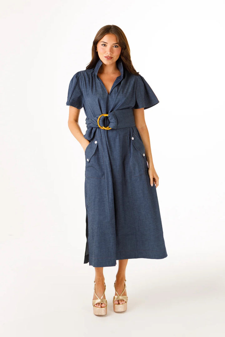 Holly Shae Gretchen denim dress with fitted bodice and knee-length skirt, casual style, shown on a hanger.