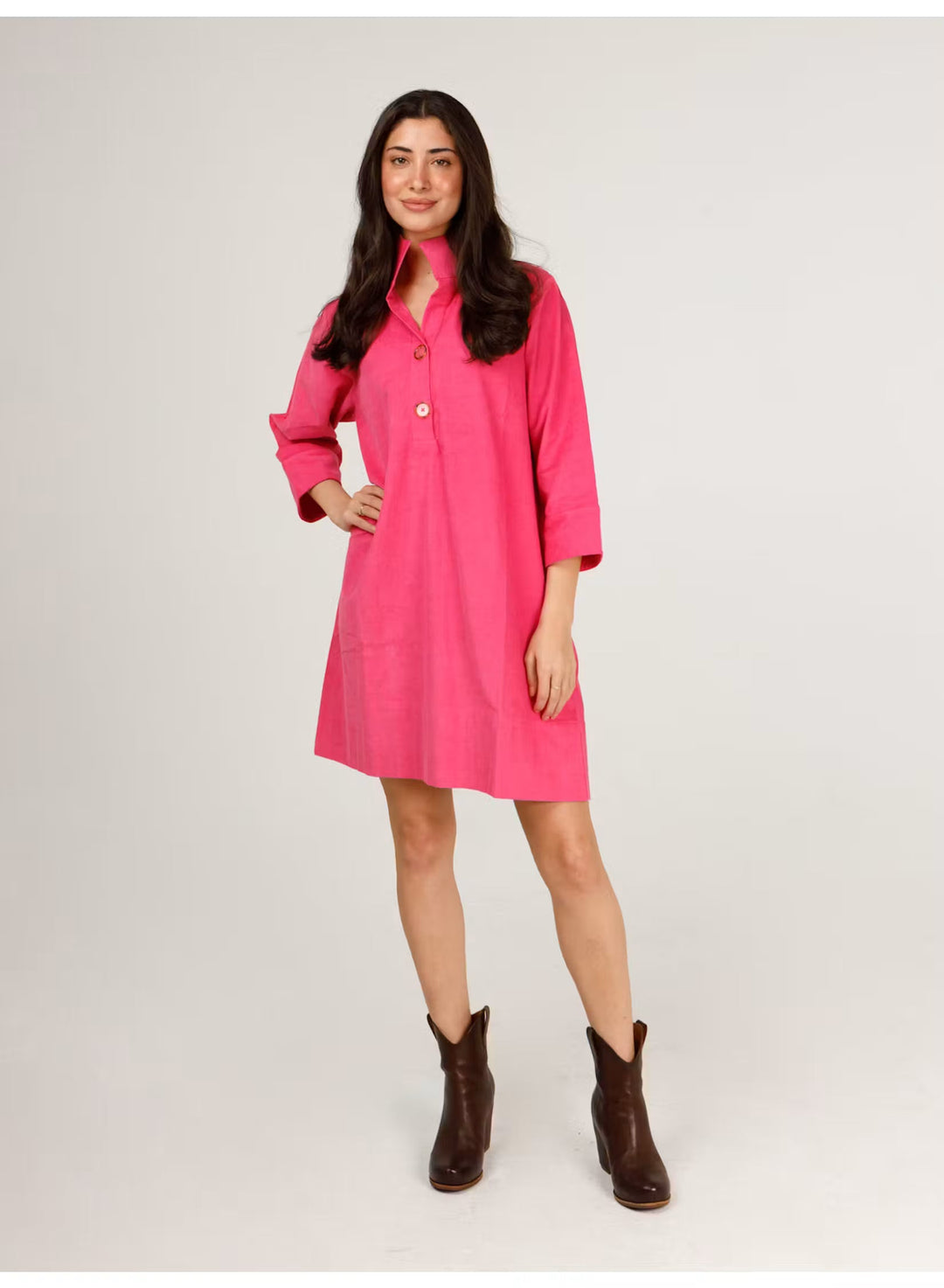 Pink corduroy Arden dress by Holly Shae, showing a stylish, knee-length dress with long sleeves and a fitted waist.