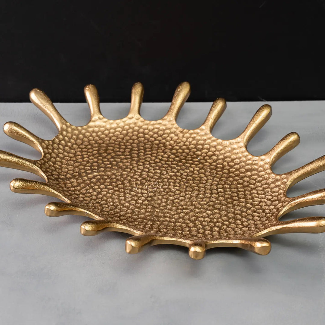 Gold oval splash dish from India Handicrafts, featuring a shiny metallic finish and elegant oval shape for home decorative use.