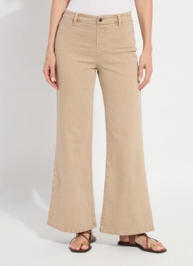 Beige wide-leg pants worn by a person on a white background