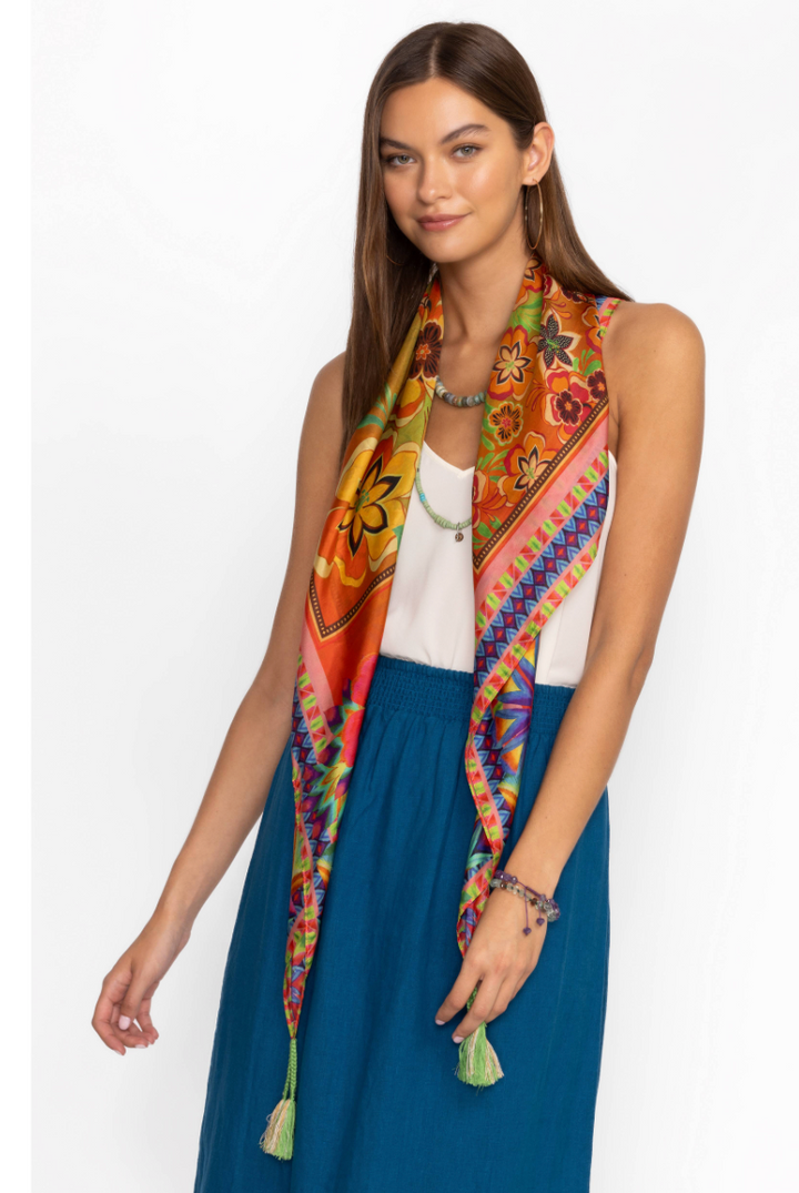 Colorful Johnny Was scarf with intricate floral patterns, styled as a versatile accessory.