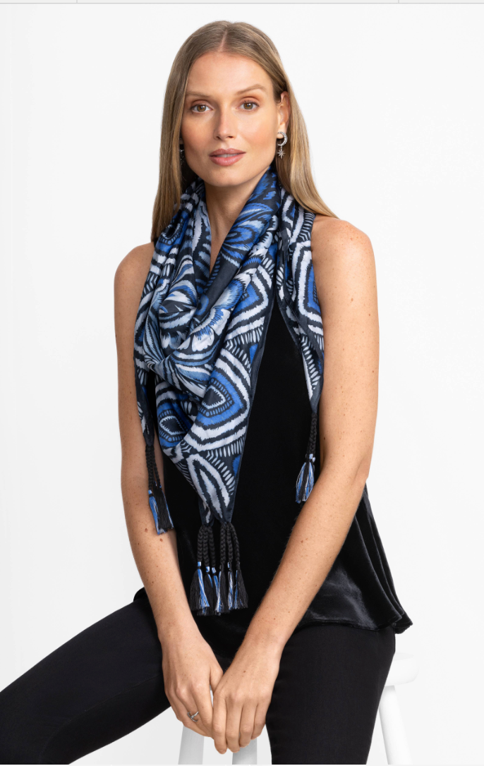 Colorful Johnny Was scarf with floral and paisley patterns, styled as a fashion accessory in the image.