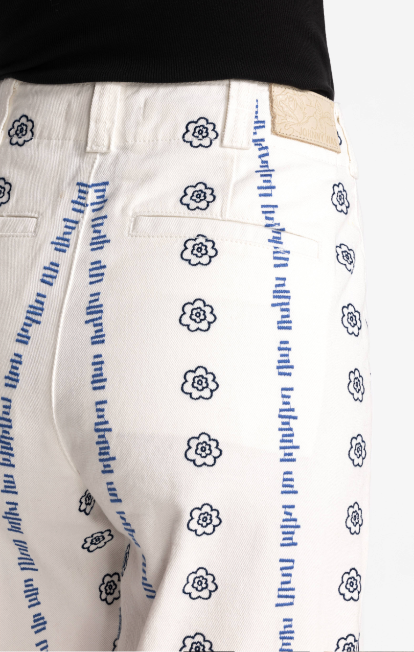 Wide leg embroidered trousers by Johnny Was, featuring intricate embroidery and flowing fabric, styled as casual or boho bottoms.