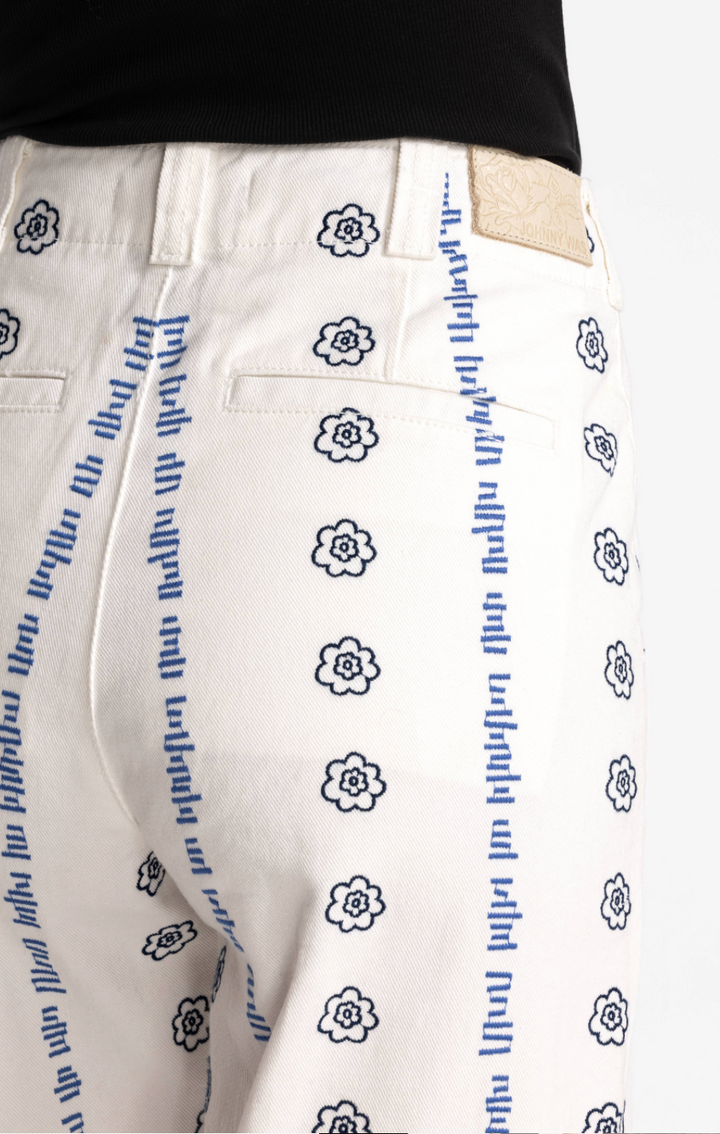 Wide leg embroidered trousers by Johnny Was, featuring intricate embroidery and flowing fabric, styled as casual or boho bottoms.