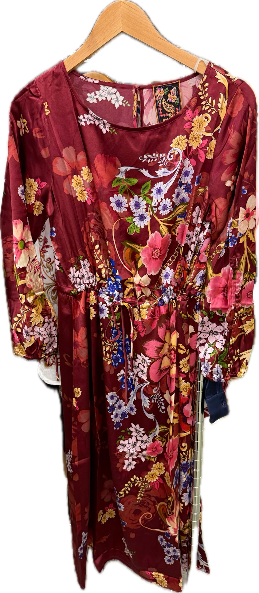 Johnny Was Lorella Rolanda dress featuring vibrant floral patterns and flowing fabric, perfect for elegant occasions.