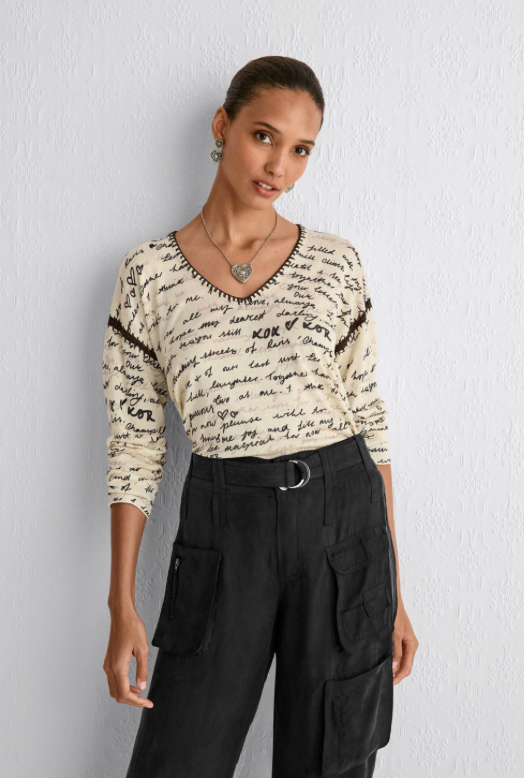Johnny Was whipstitch V-neck pullover top, featuring detailed stitching and a relaxed fit, shown in a casual front view.
