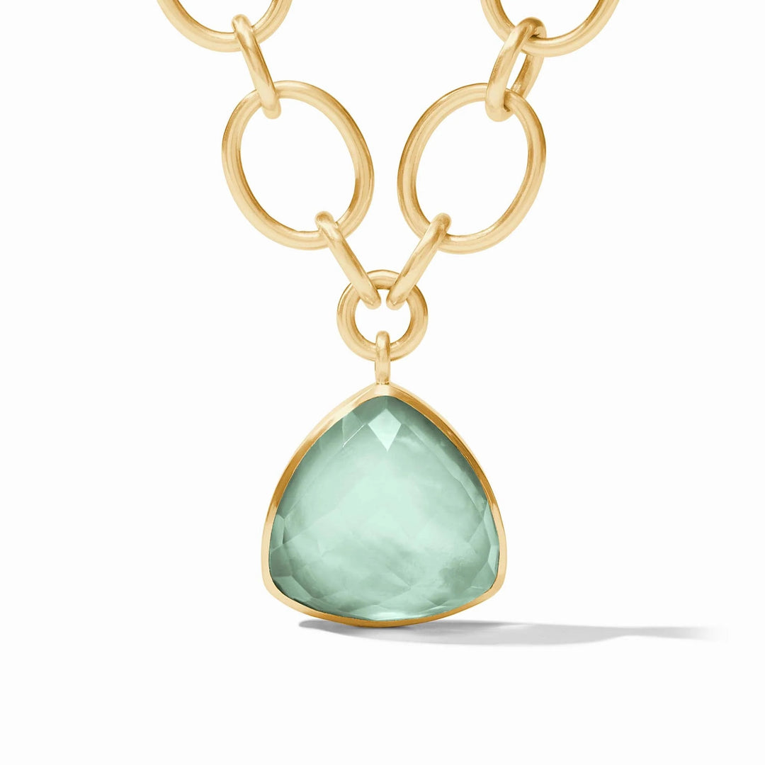 Julie Vos Aquitaine statement necklace featuring bold gold-tone jewelry with intricate design and elegant accents.