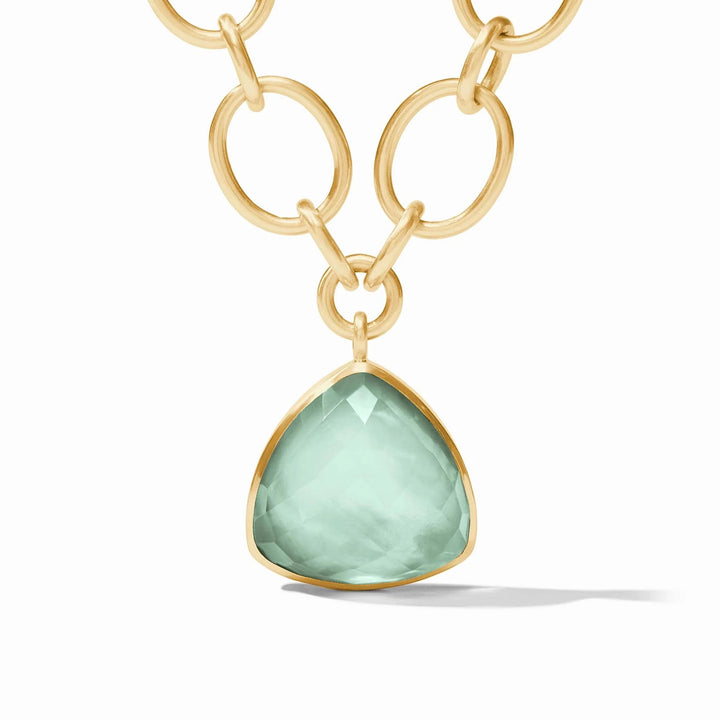 Julie Vos Aquitaine statement necklace featuring bold gold-tone jewelry with intricate design and elegant accents.