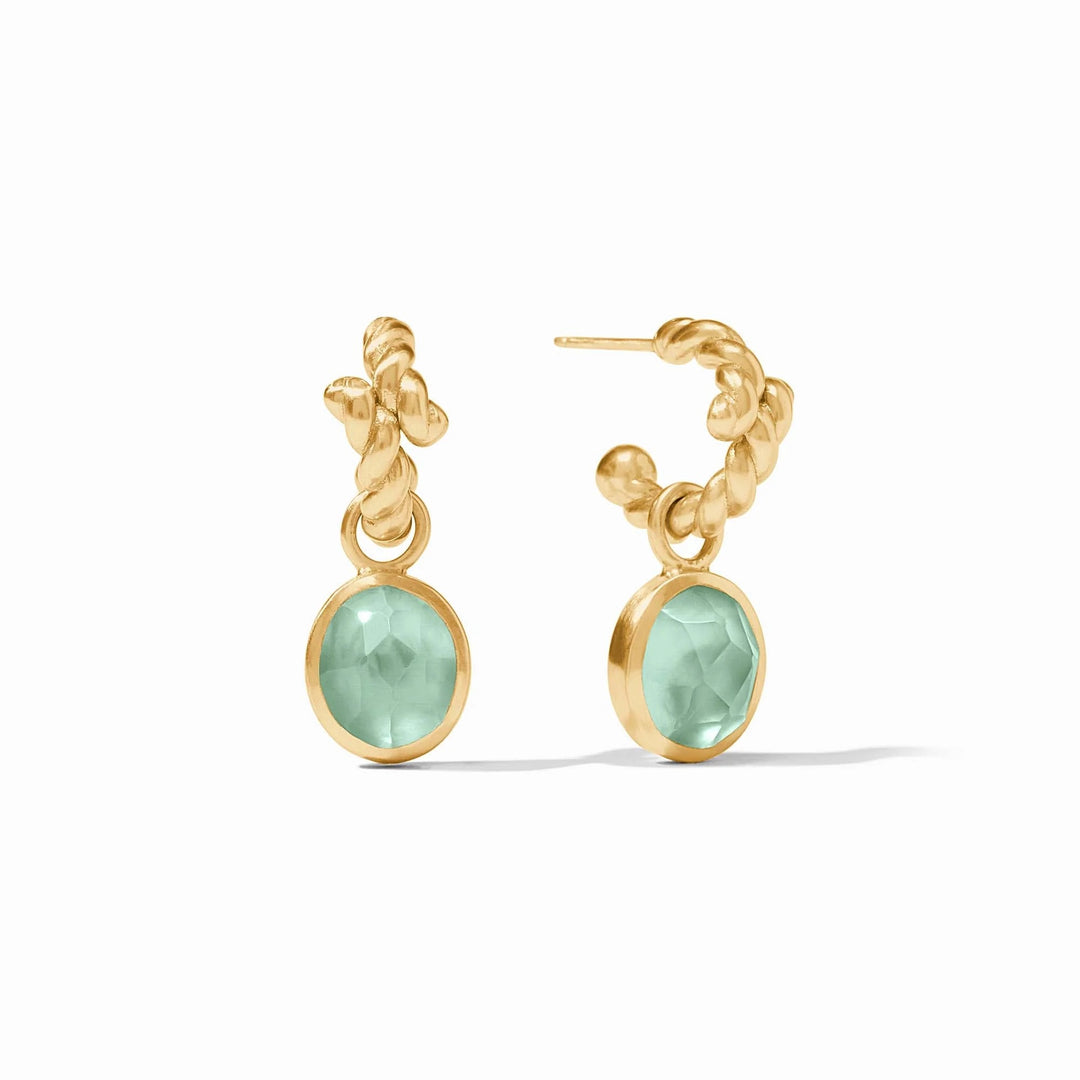 Julie Vos Nassau Hoop and Charm accessories featuring gold hoops with attached decorative charms on a neutral background.