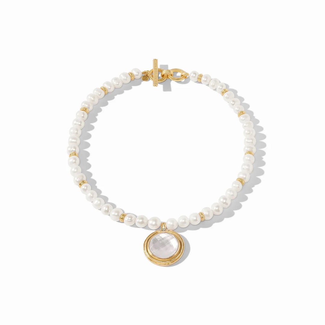 Julie Vos Astor Statement Necklace with intricate gold-toned design and elegant embellishments, perfect for accessorizing.