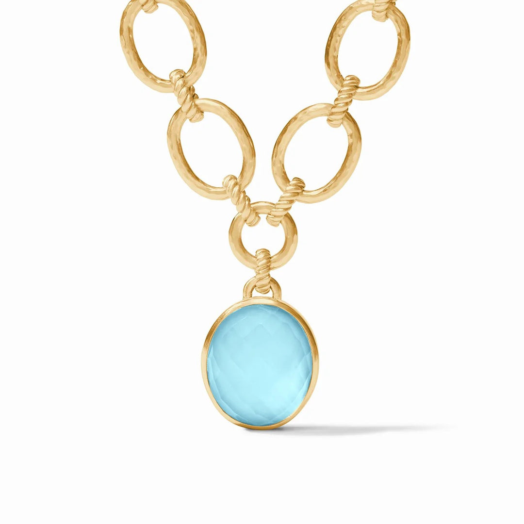 Julie Vos Nassau statement necklace featuring layered gold-tone chains and elegant design, perfect for accessories and stylish outfits.