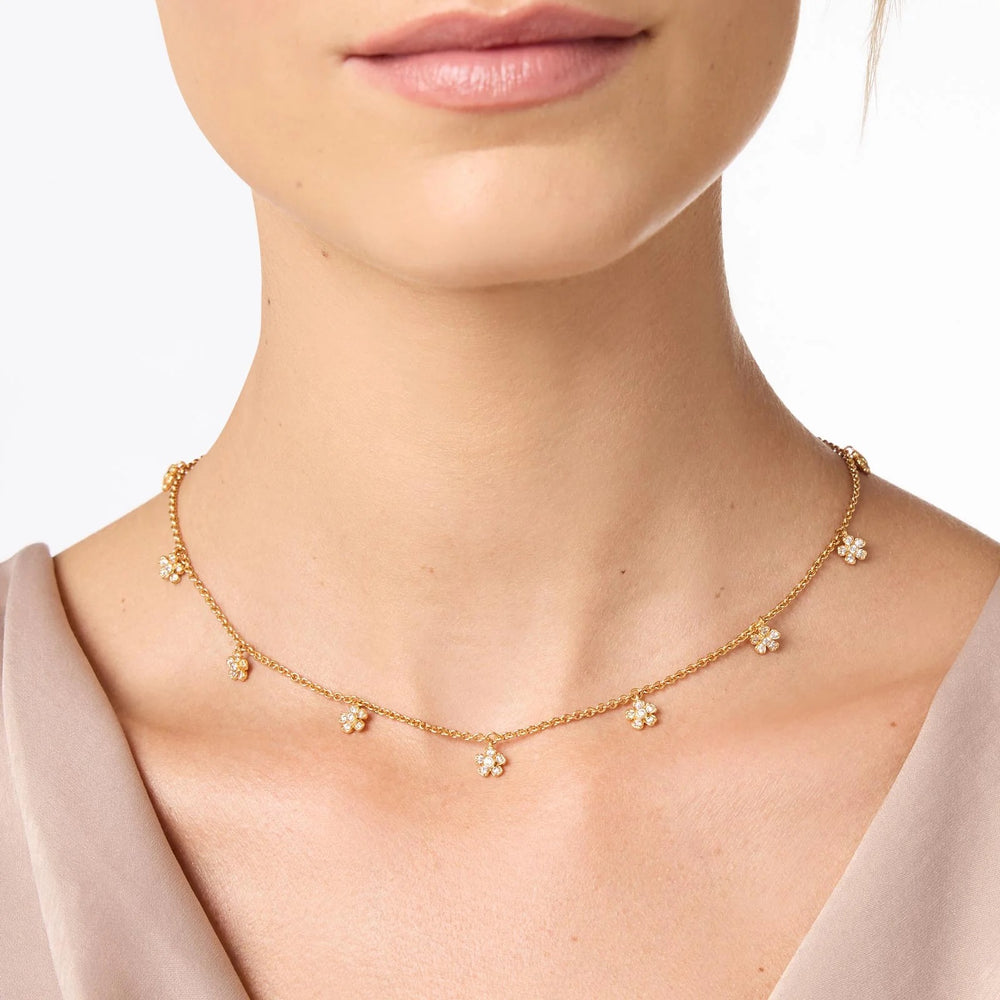 Julie Vos Laurel Delicate Charm Necklace with a small leaf pendant, showcasing fine jewelry craftsmanship.