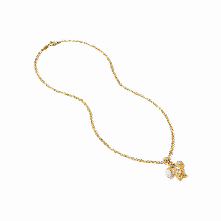 Julie Vos Sanibel Trio Charm Pendant showing three linked gold charms with intricate detailing on a chain.