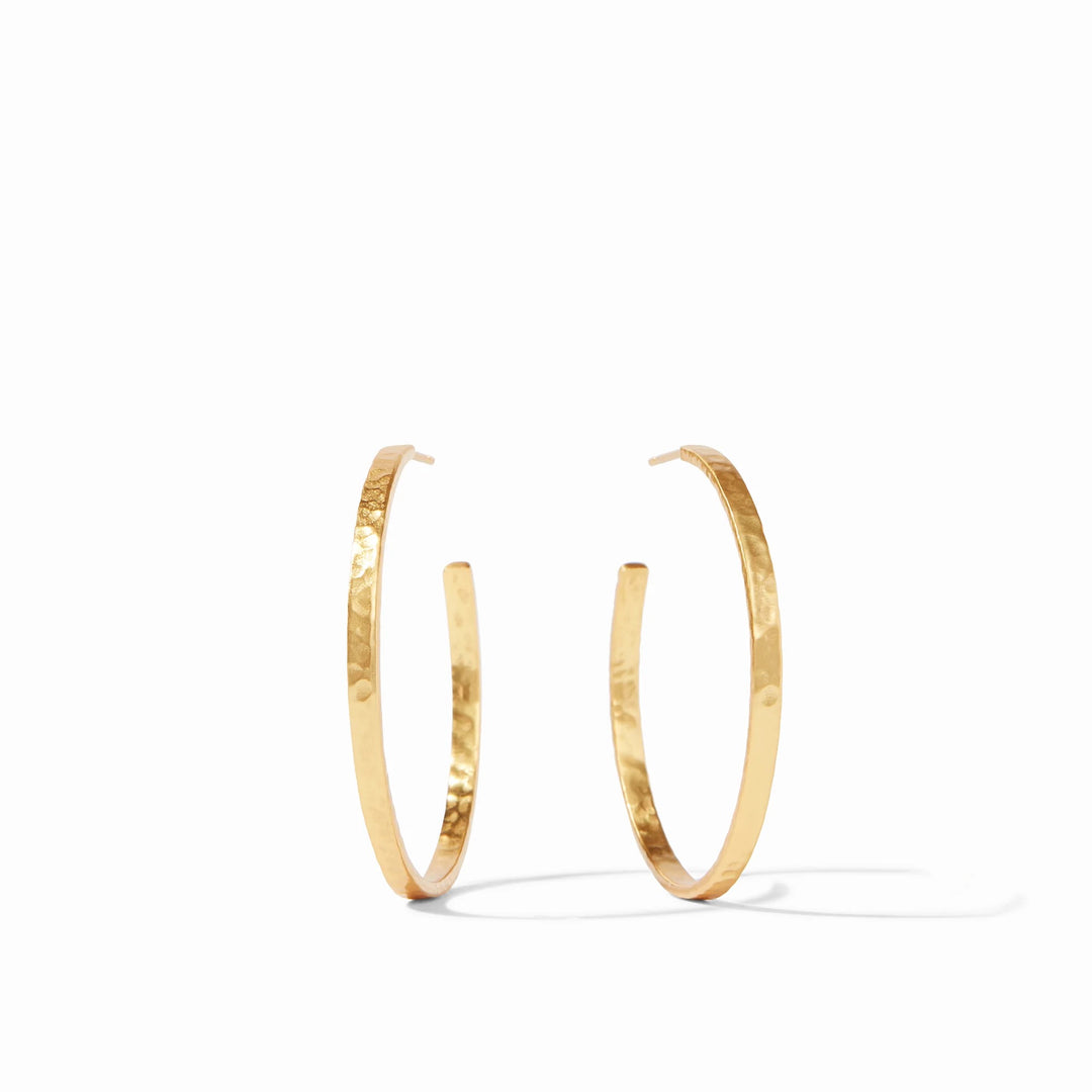 Julie Vos Crescent Hoop earrings in gold, featuring a sleek, curved design, worn as stylish accessories for everyday or special occasions.