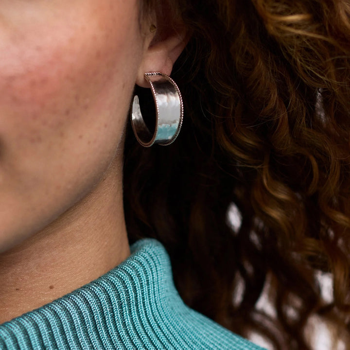 Silver Savoy Hoop earrings by Julie Vos, showcasing elegant, polished jewelry accessories with a sleek hoop design.