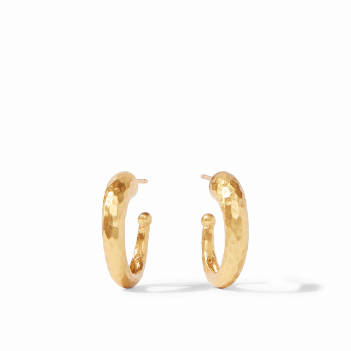 Hammered gold hoop earrings by Julie Vos, stylish hammered hoop accessories with a polished finish, close-up view.