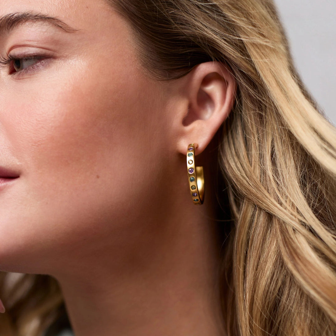 Julie Vos rainbow hoop earrings, colorful accessories with vibrant rainbow hoops, stylish jewelry for a bold look