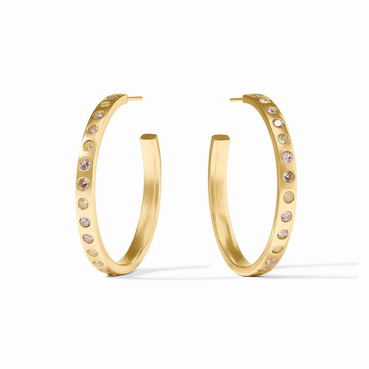 Colorful rainbow hoop earrings by Julie Vos, vibrant accessories with multicolored circular design, close-up view.