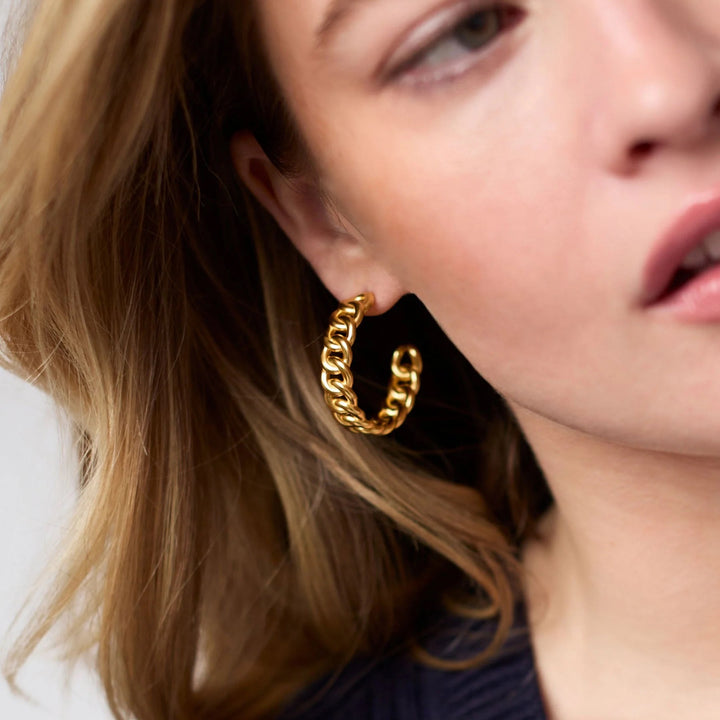 Julie Vos Dolce Hoop earrings, elegant gold-toned accessory with a smooth, rounded hoop design for stylish wear.