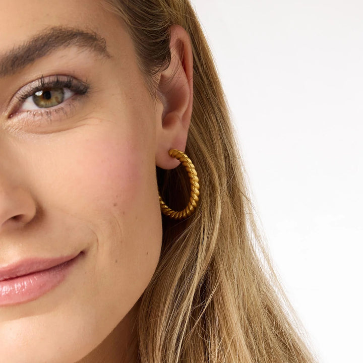 Julie Vos Nassau Hoop earrings, gold-toned accessories with a sleek hoop design, shown on a neutral background.
