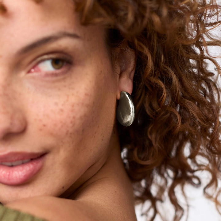 Silver Solara Hoop Earring by Julie Vos, showcasing a sleek, polished hoop design perfect for stylish accessories.