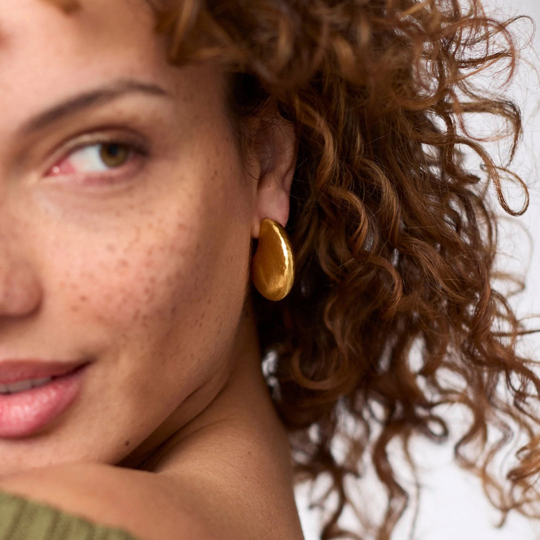 Julie Vos Solara hoop earrings, stylish gold-tone accessories with a sleek, modern design, perfect for everyday wear.