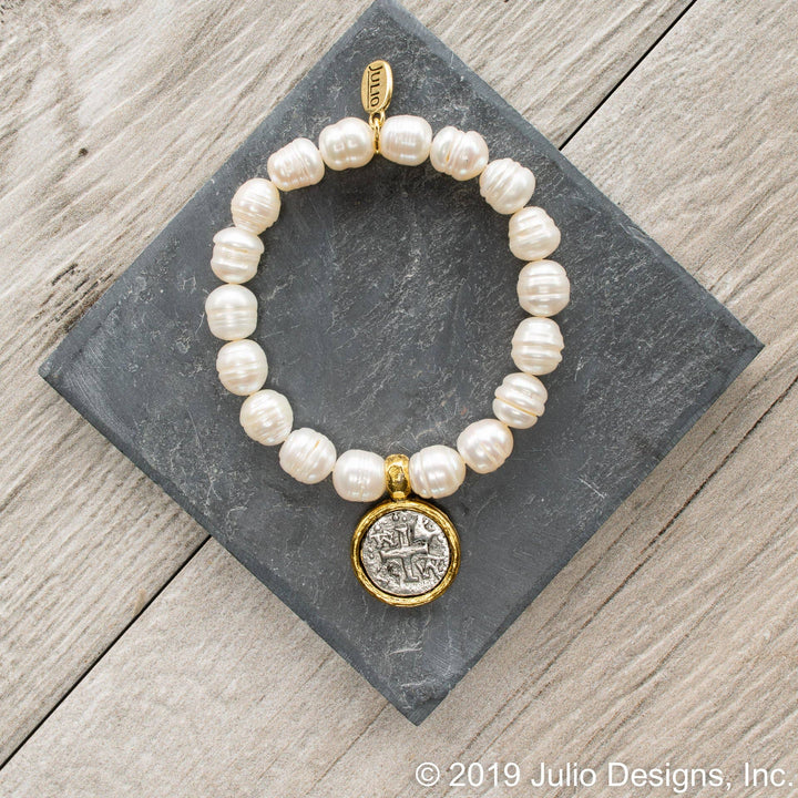 Silver fairy bracelet by Julio Designs featuring delicate fairy charm and intricate detailing, perfect for accessories.