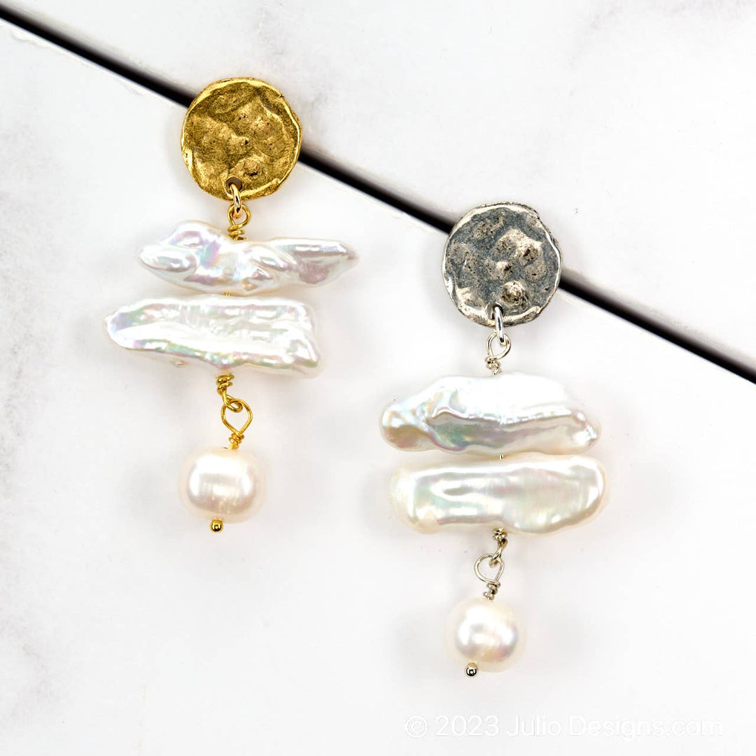 Pearl dangle earrings by Julio Designs featuring elegant white pearls hanging from silver hooks.