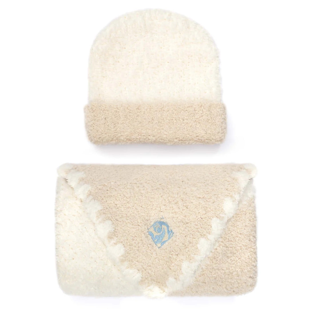Kashwere striped baby blanket and matching hat set featuring soft fabric in colorful stripe pattern for cozy warmth.