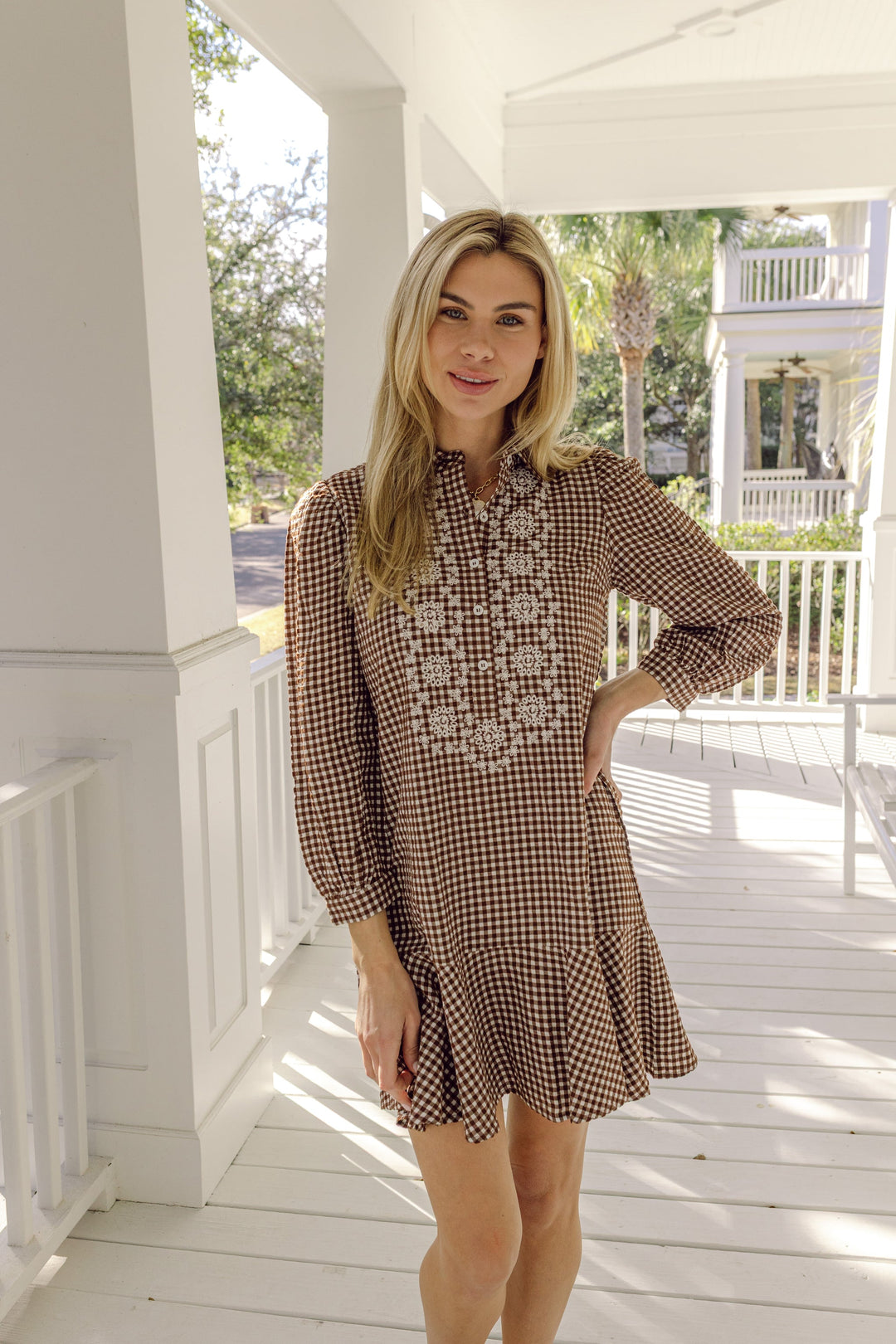 Gingham Ruffle Shirt Dress by Sail to Sable, featuring a button-down front, ruffled collar, and short sleeves, stylish and lightweight.