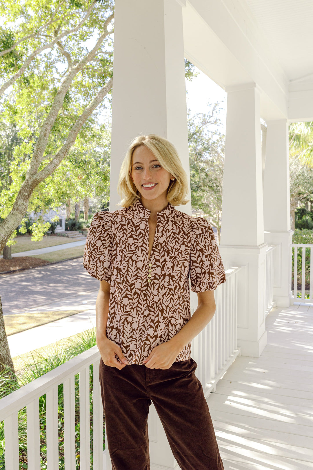 Floral vine print Sail to Sable tunic top with long sleeves and a relaxed fit, featuring vibrant floral patterns and a comfortable design.