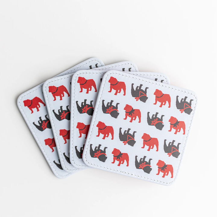 Set of four colorful Keva Style home coasters with vibrant patterns, perfect for protecting surfaces in a stylish way.