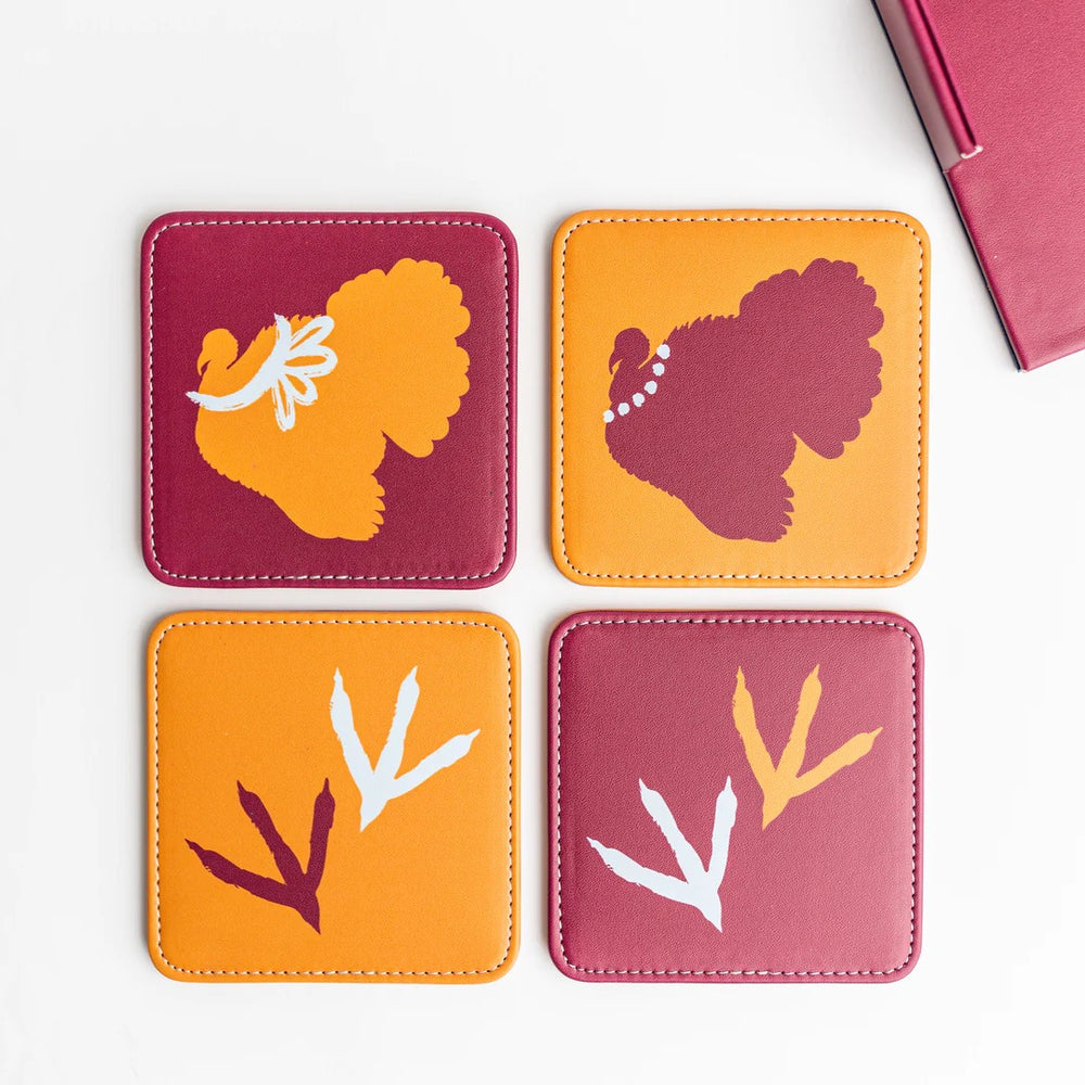 Set of four colorful Keva Style home coasters featuring vibrant patterns for protecting surfaces.