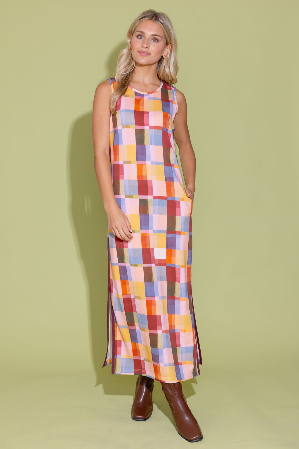 Alden Adair Berkley terracotta check dress with long sleeves and a fitted waist, displayed on a hanger.