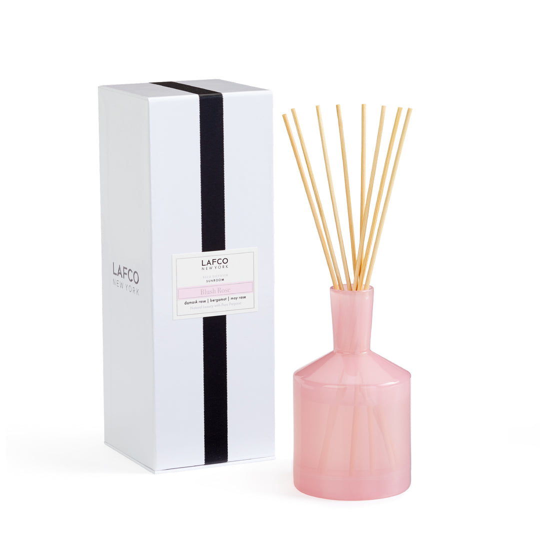 Lafco 6oz home diffuser with a clear glass bottle and reed sticks for elegant scent diffusion.