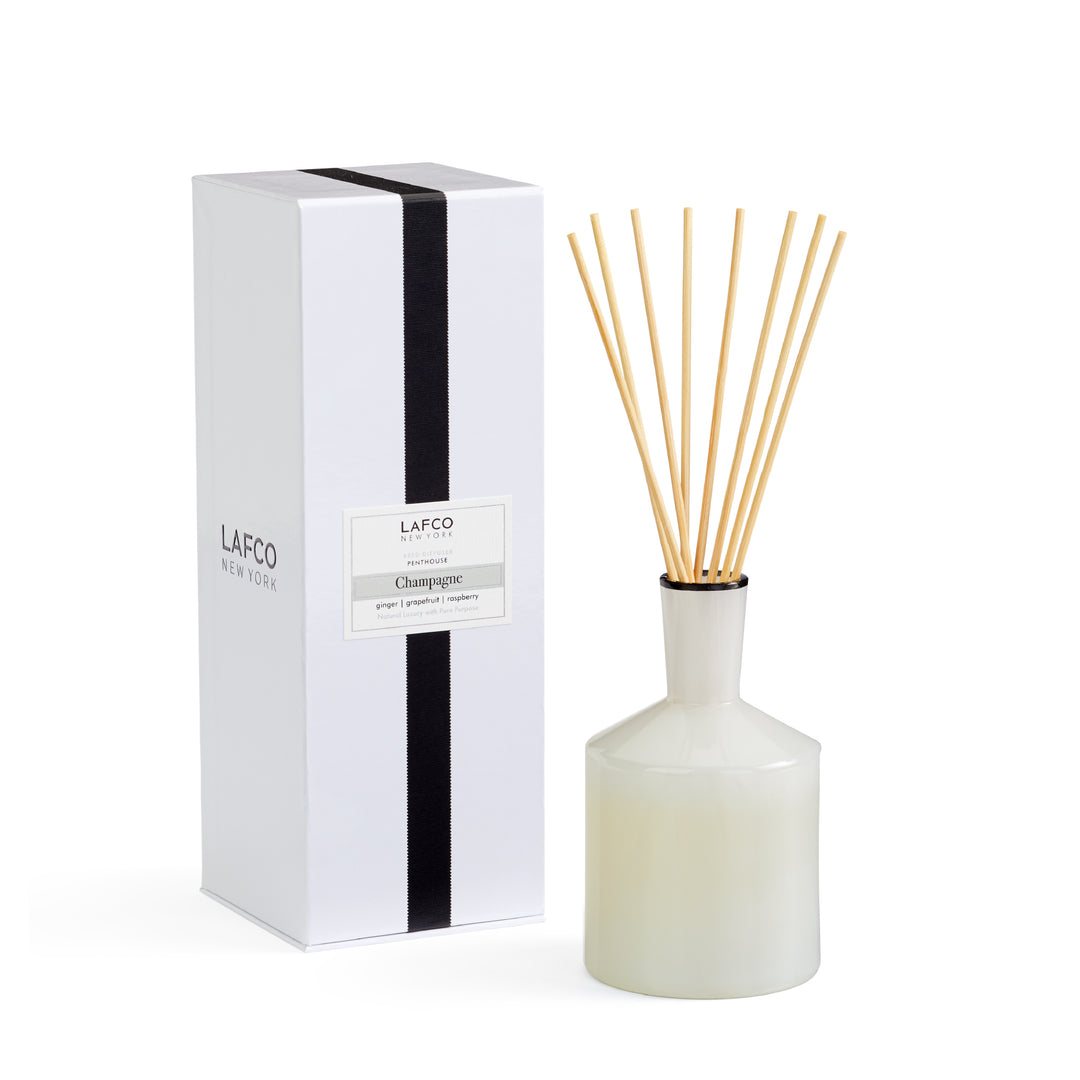 Lafco 6oz home diffuser with a sleek glass bottle and reed sticks for elegant fragrance diffusion.