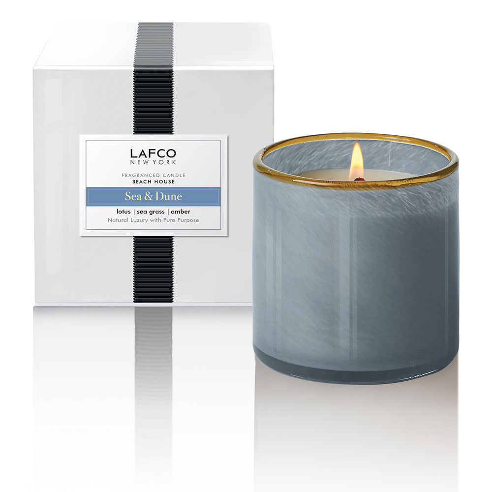 Lafco 15.5oz home candle with a sleek glass holder and elegant wick, perfect for adding ambiance to any room.