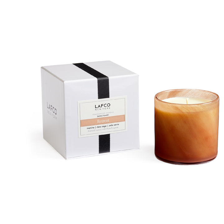Lafco 15.5oz home candle with elegant glass jar, featuring a clean, modern design and a white wax interior.