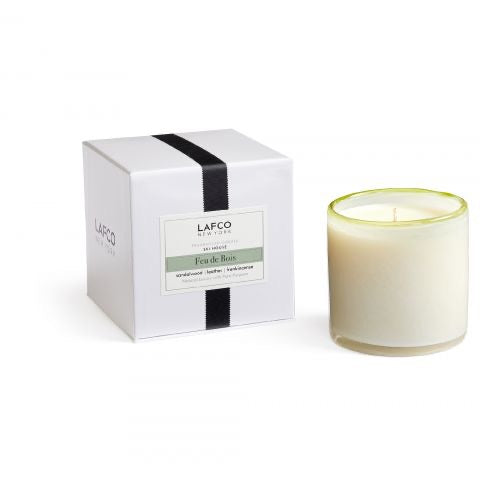 Lafco 15.5oz home candle with a sleek glass jar and white wax, designed for elegant interior decor and ambient lighting.