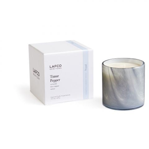 Lafco 15.5oz scented candle in a clear glass jar, designed for home ambiance and elegant decor.
