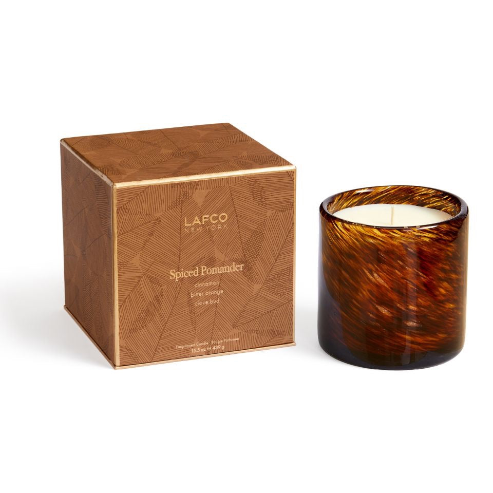 Lafco 15.5oz home candle in a glass jar with a white wax candle, designed for elegant home decor and ambient lighting.