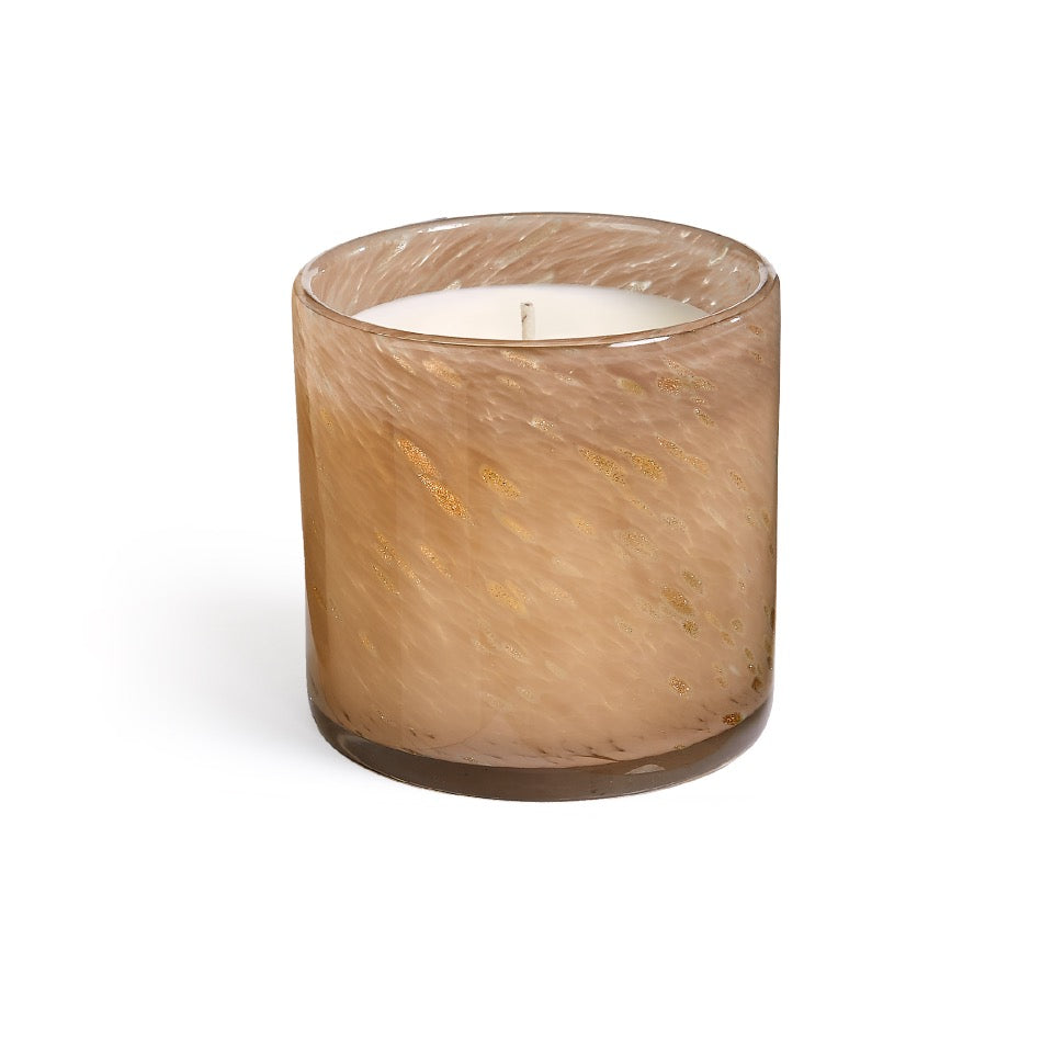 Lafco 15.5oz home scented candle with a sleek glass container and a burning wick, creating a cozy ambiance.