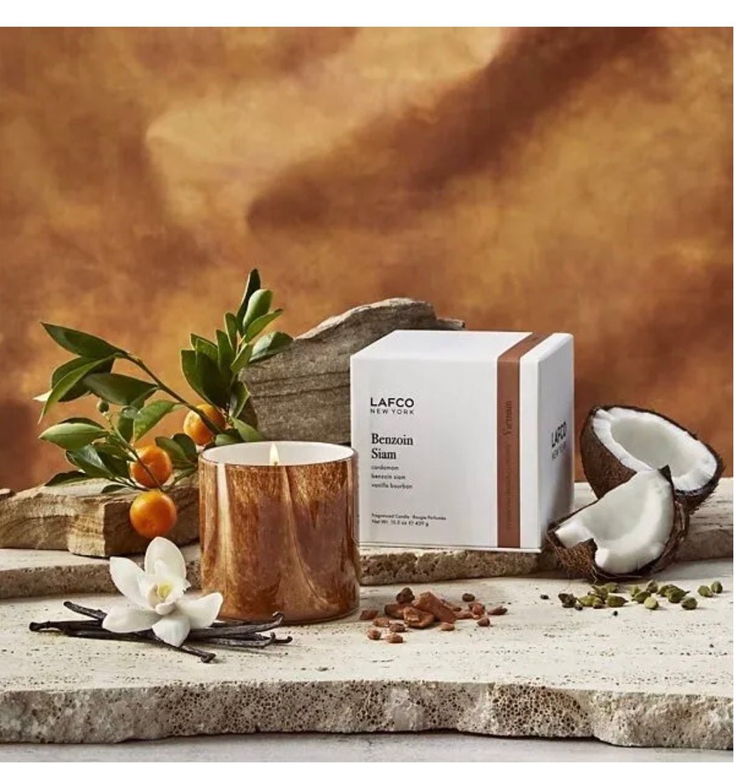 Lafco 15.5oz home candle with a glass container and elegant label, designed to add a sophisticated ambiance to any space.
