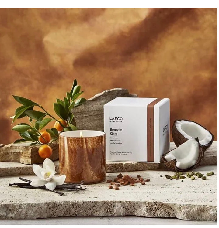 Lafco 15.5oz home candle with a glass container and elegant label, designed to add a sophisticated ambiance to any space.